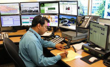 emergency operator takes notes in dispatch center