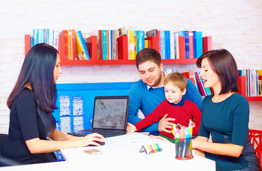 A young family at the office of a health care professional