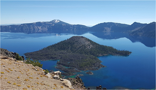 Crater Lake with island in the middle of it in Southern Oregon