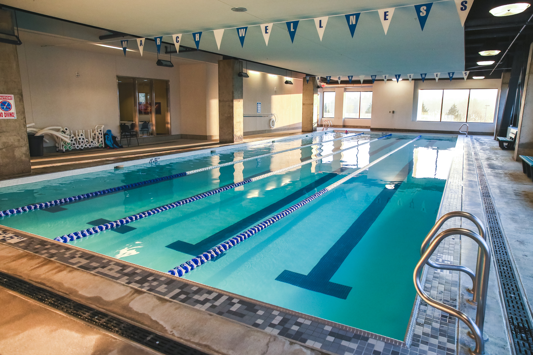 Wide view of march wellness four-lane lap swimming pool.