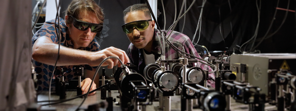 Graduate student and his faculty mentor work together to set up a two-photon microscope