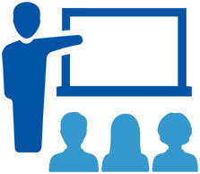 Standing teacher at a presentation board with three people in the audience icon