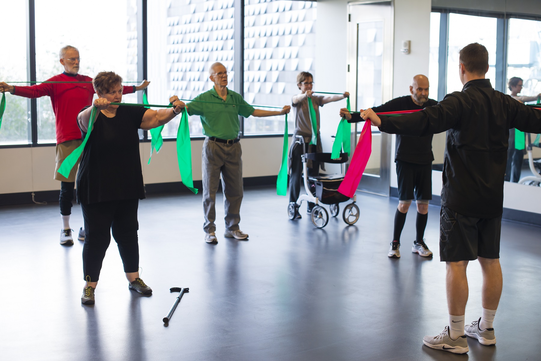 Six participants following instructors directions for exercises in a Parkinson’s class.