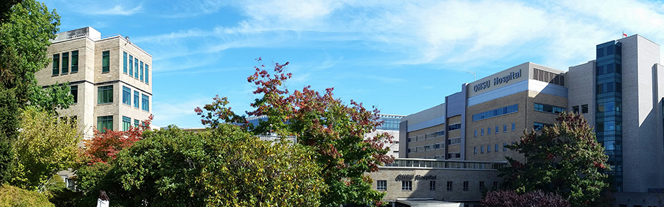 A sunny day view of the OHSU campus, with the hospital on the right