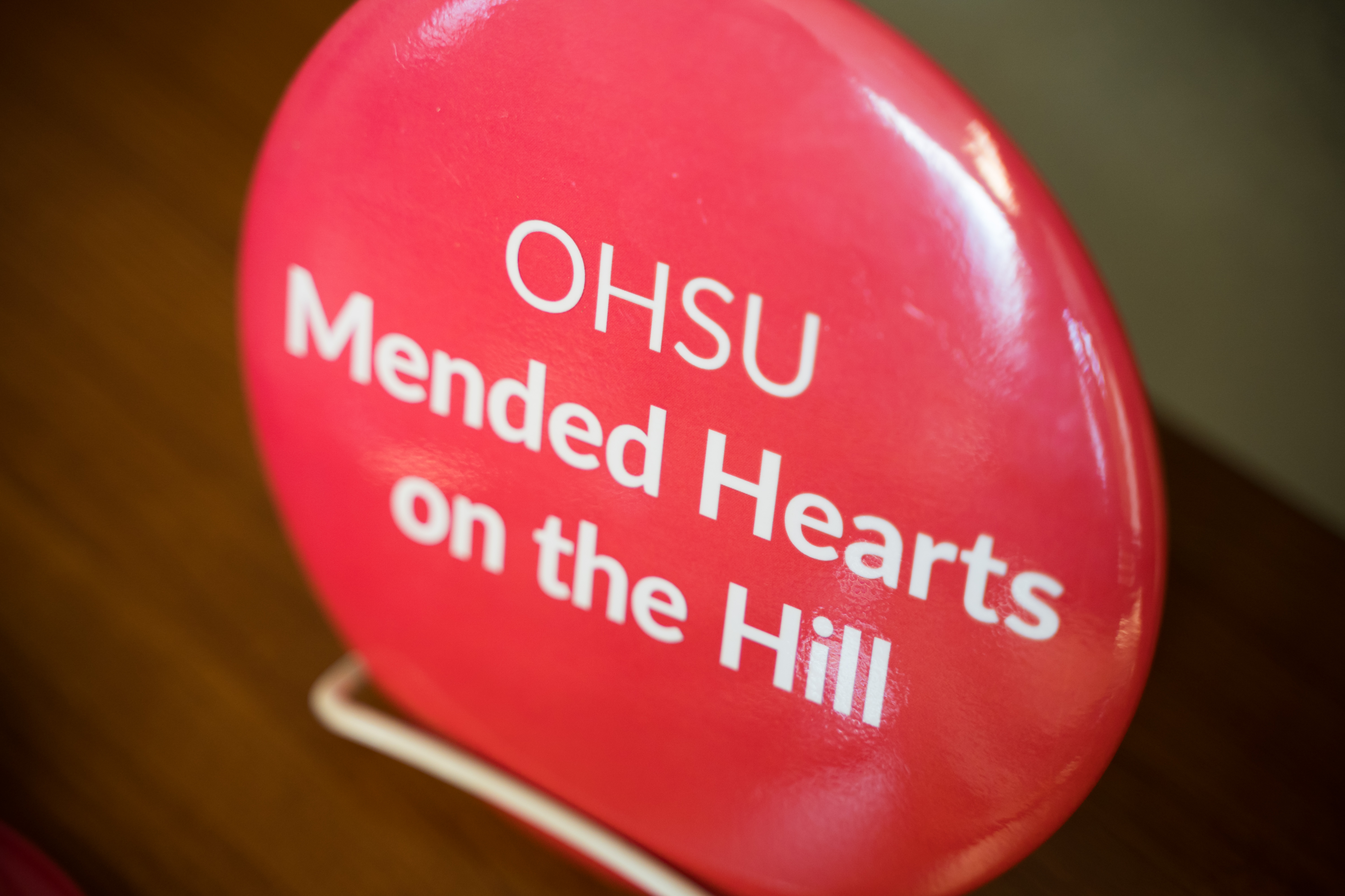 Large button that says OHSU Mended Hearts on the Hill
