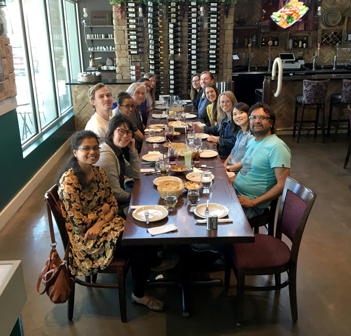 Coussens Lab researchers dining out together, 2019.