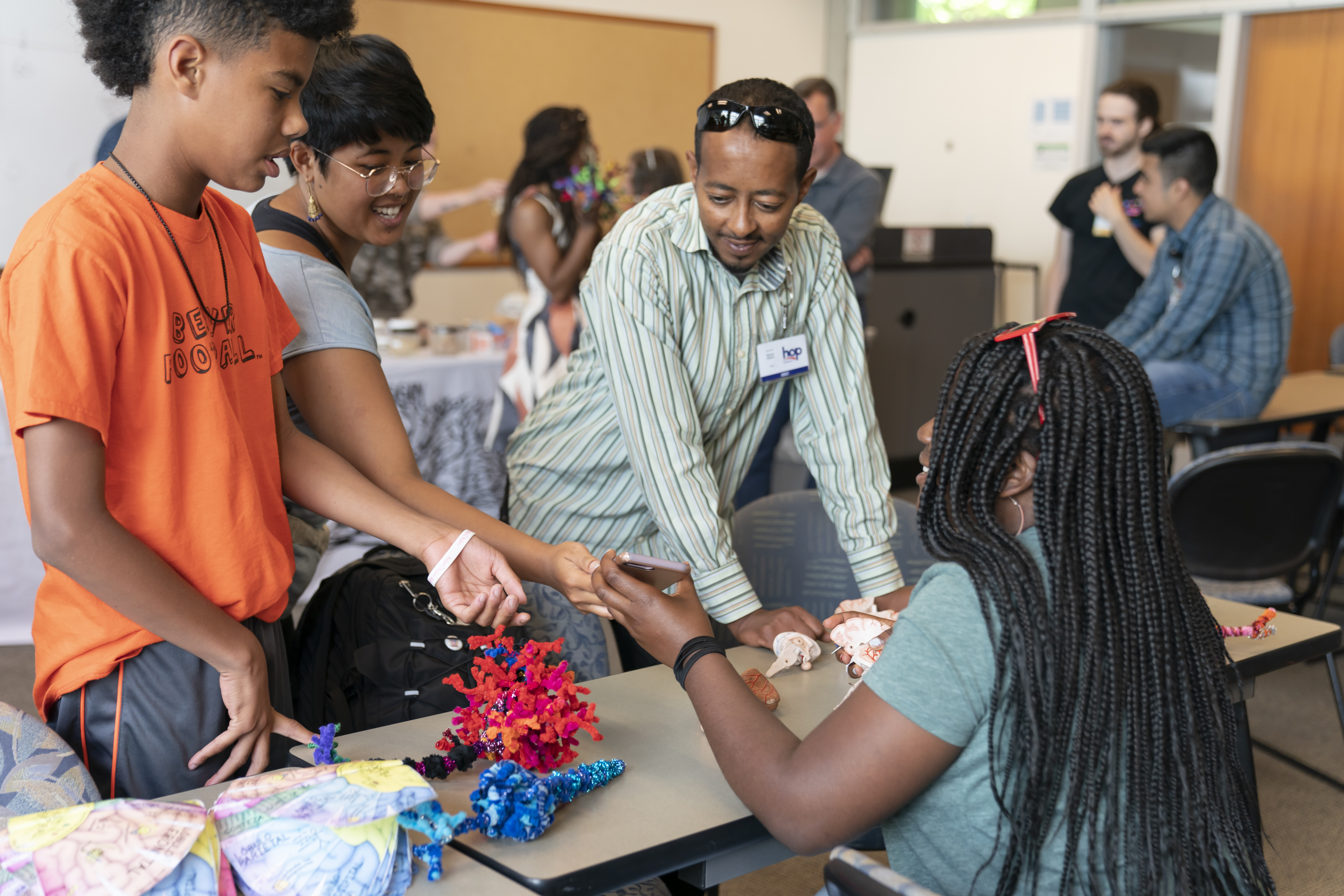 Students play with models of neurons and the brain at Camp ELSO 2019
