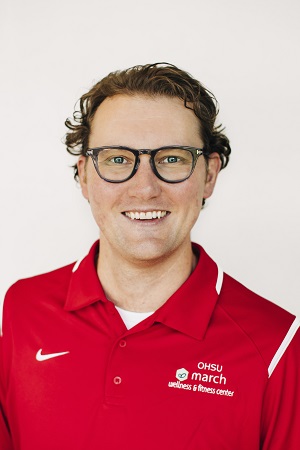 Nick Parker image with glasses and red jacket