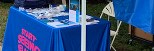 An image of a Start Seeing Melanoma table at an event