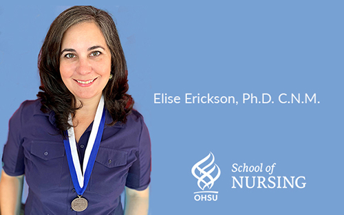 Elise Erickson, Ph.D., C.N.M. wearing her fellowship medallion