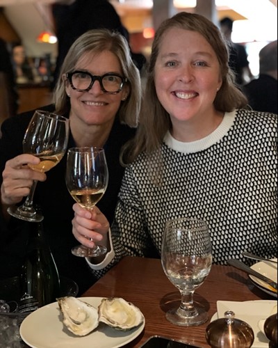 Amy Moran and Jen Wargo toasting to a recent Nature publication