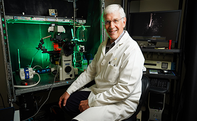 Professor Chuck Allen in laboratory microscopy room.