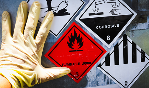 Warning symbol for chemical hazard on chemical container, chemical in factory