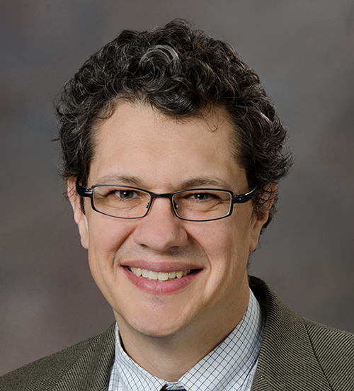 Headshot photo of Mark Kinzie, M.D., Ph.D.
