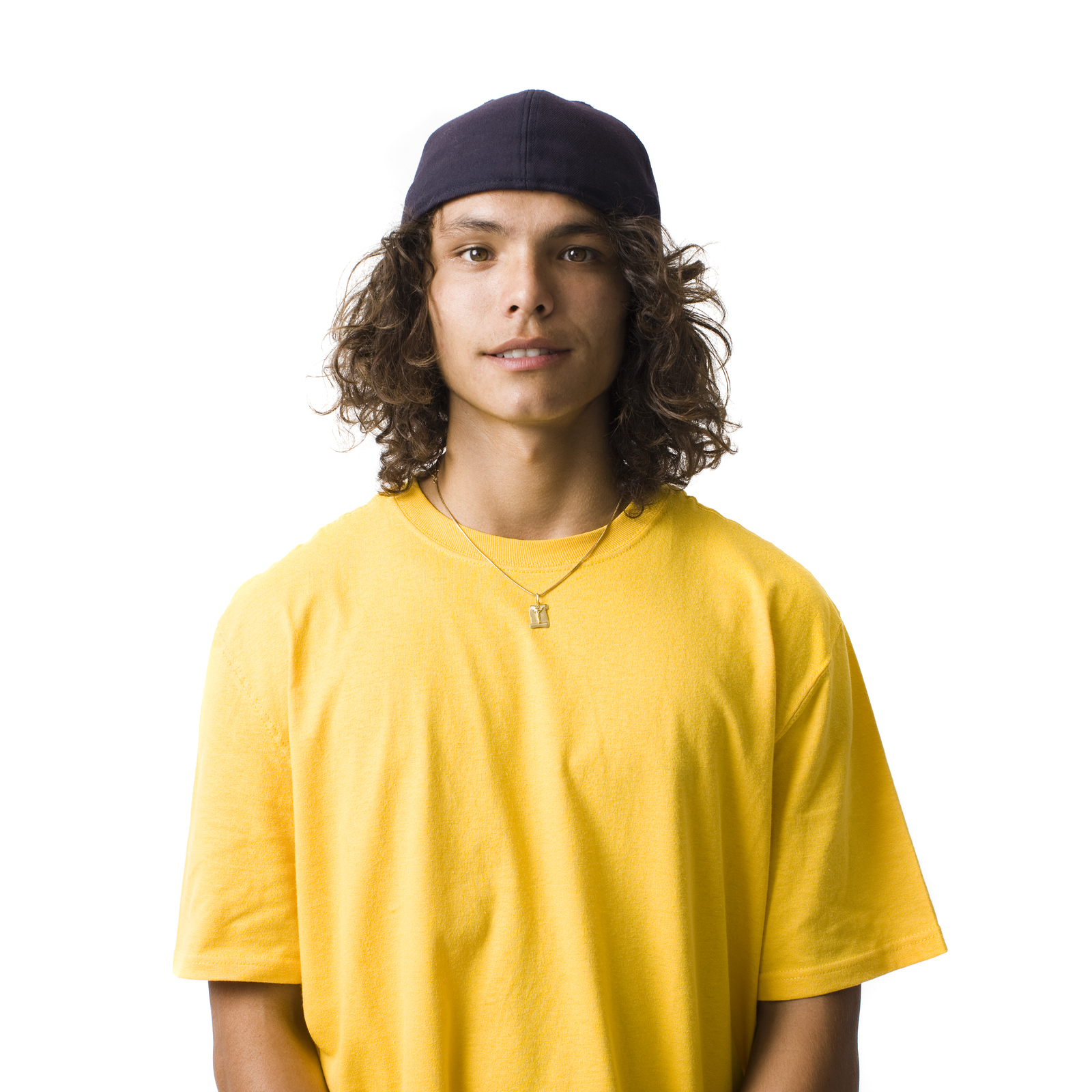 Teen in hat standing with confidence