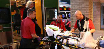 panda emergency medical technicians treat patient during transport