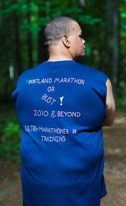 Dorrian Rhodes wearing a shirt with "Portland Marathon or bust!"