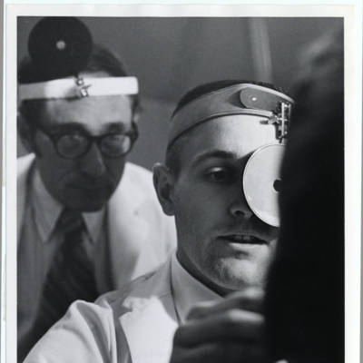 Ophthalmology student with instructor, circa 1940s