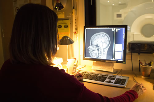 SCAN Lab researcher studying imaging of the brain