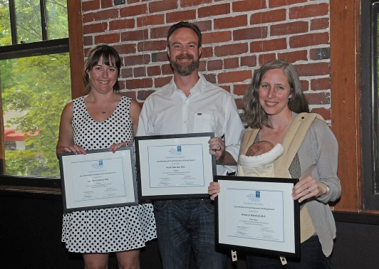 Woodcock Paper Winners holding awards