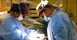 Surgeons performing a transplant