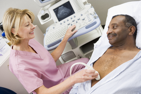 Ultrasound Tech scanning patient