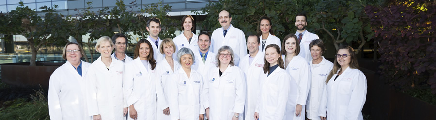 The Melanoma and other skin cancers team pose for a photo in front of the knight cancer institute