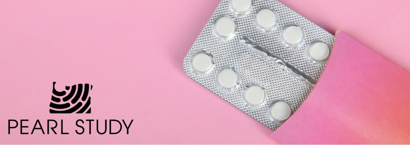 Birth control pill packet on pink background