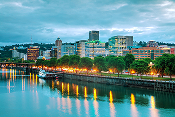 Image of the Willamette River and the city of Portland at twilight. 