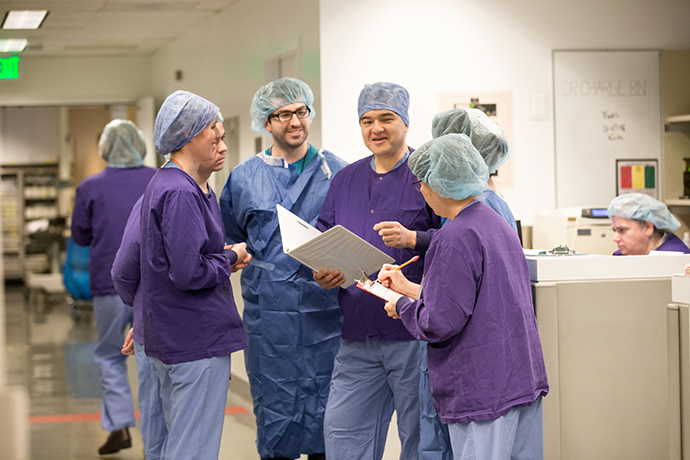 Dr. Lauer and nurses prepare for eye surgery
