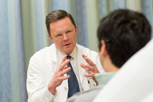 Dr. Amling talking with a patient