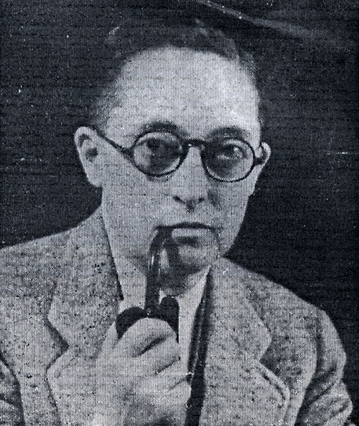 portrait of Alan Hart from dust jacket of book, wearing spectables and smoking pipe