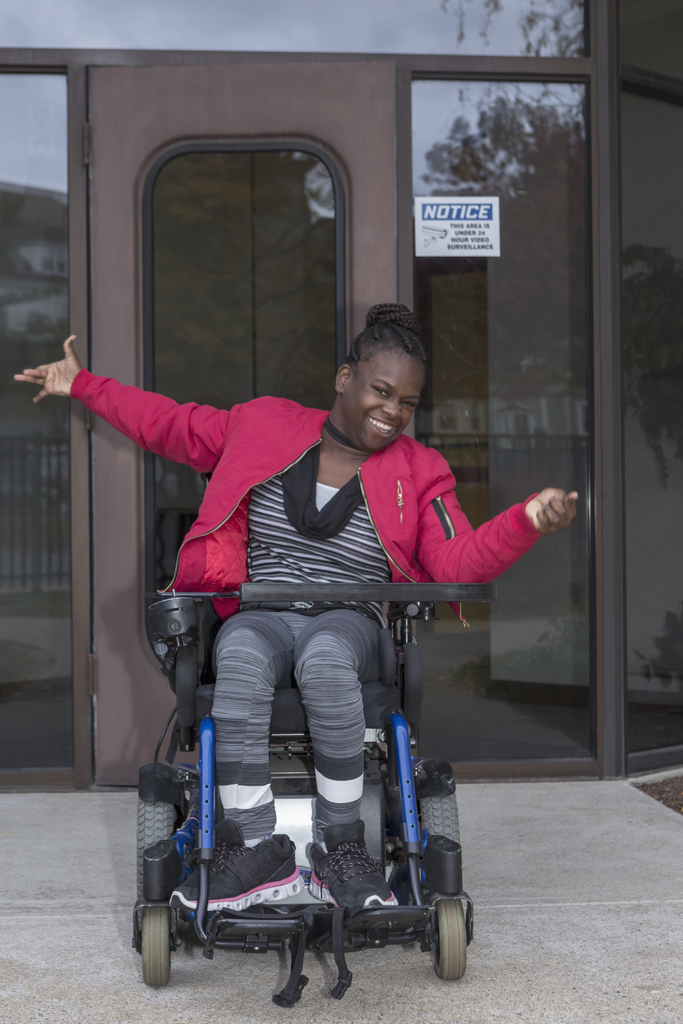 celebrating travel acheivment youth in wheelchair
