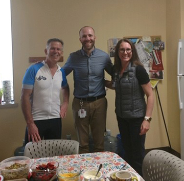 Dr. Wilson reaches his final Tour de Casey destination at the Casey clinic in Astoria.