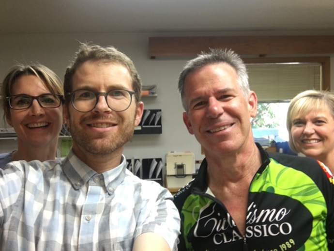 Dr. Wilson visits with Dr. Gebhard and staff at the Hood River clinic