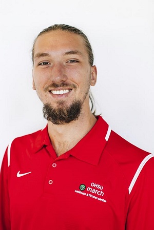 Jake Pavkov of March Wellness in red polo shirt.