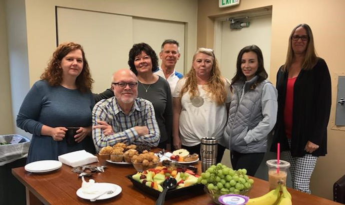 Dr. Wilson has breakfast with staff at the Longview clinic