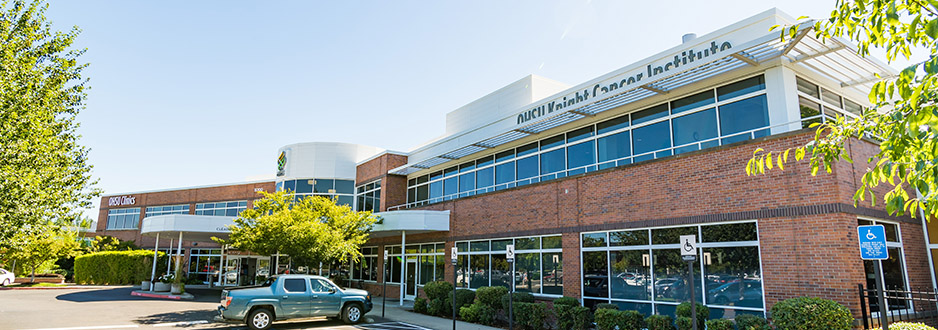 The parking lot and front entrance to the OHSU clinics building in Beaverton.