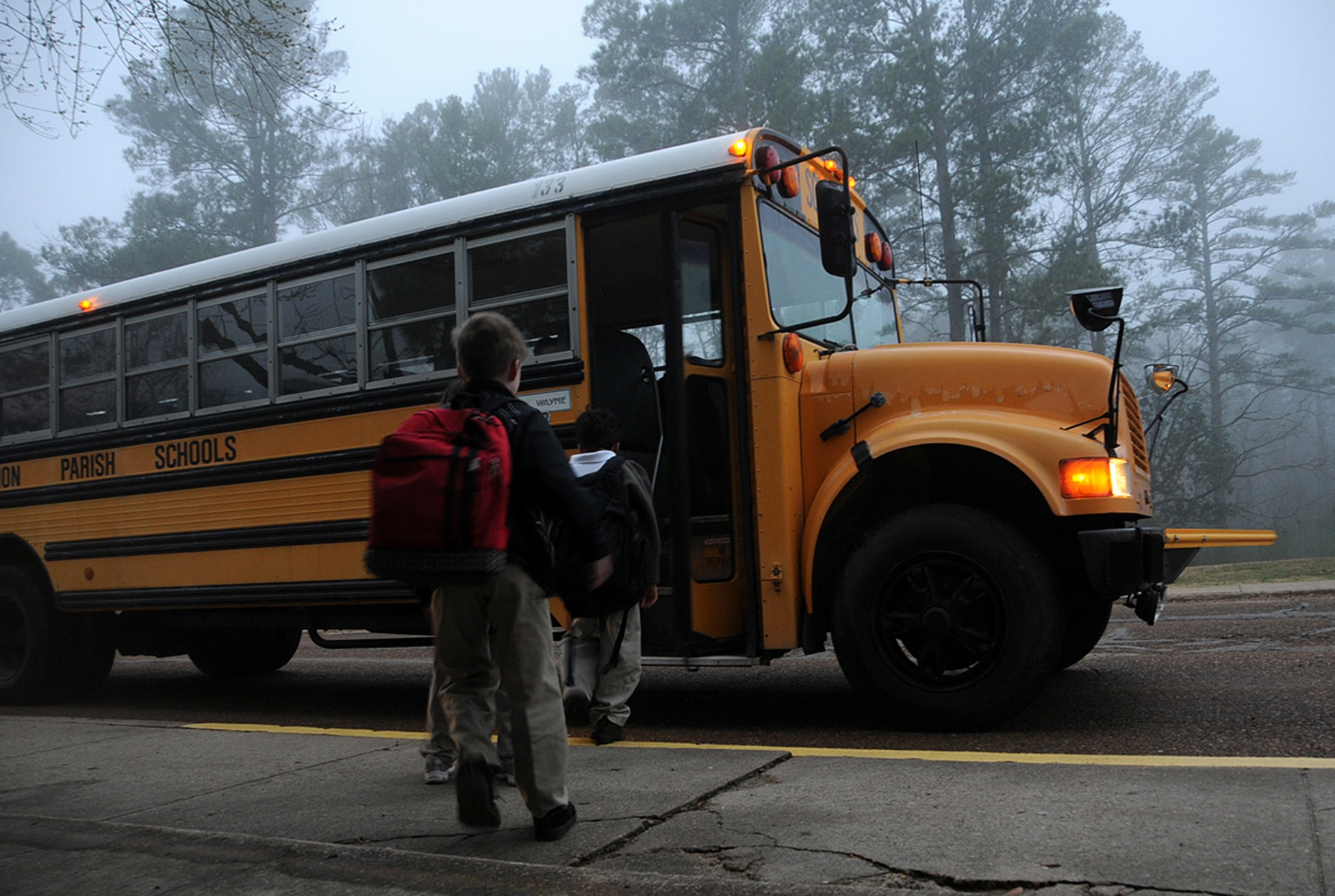 kids riding school bus