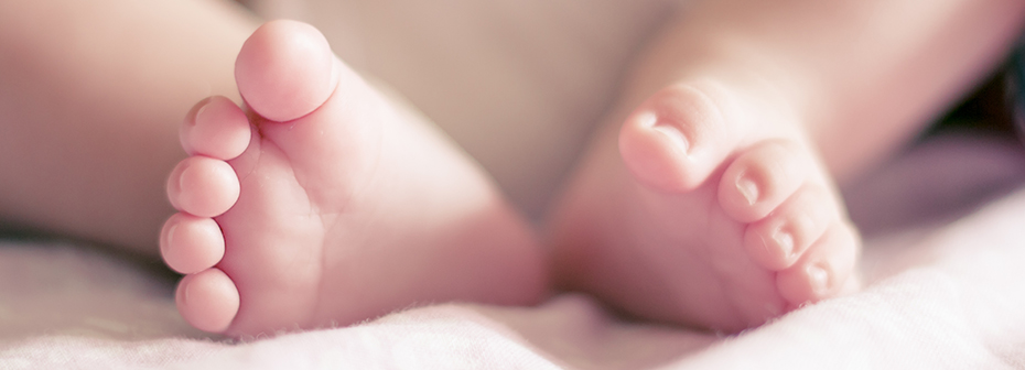 An image of a newborn baby's feet.