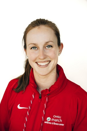 Kimberly Marston with ponytail and red jacket