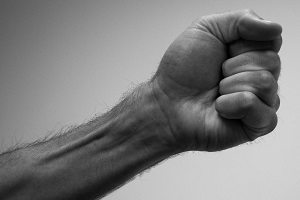 Image of a fist being made during a medical screening procedure.