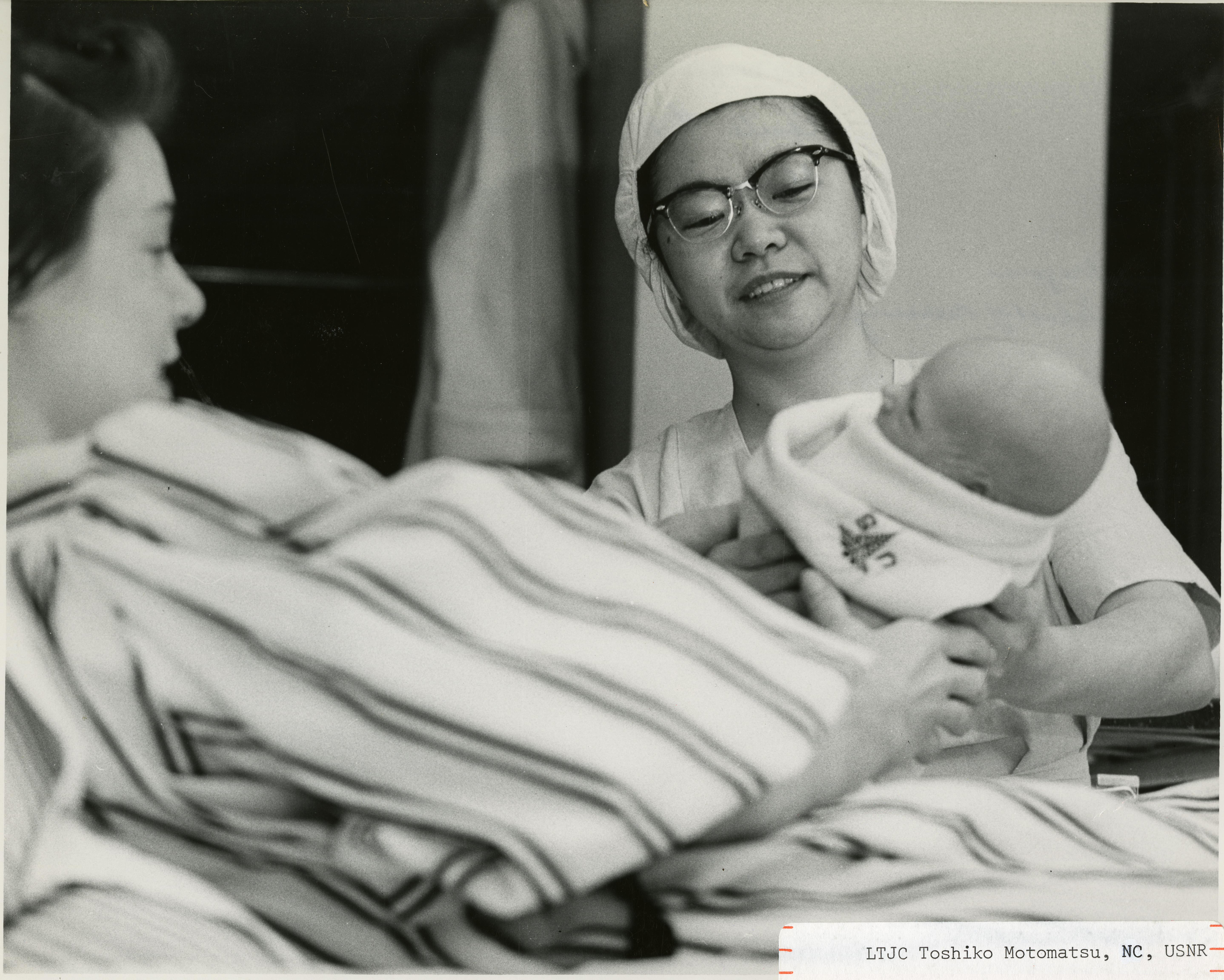 Toshiko Totomatsu working as a Labor & Delivery nurse in the Army Nursing Corps, 1955