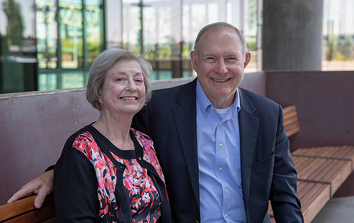 Jane and Joe Gray, posed together, smiling, at OHSU