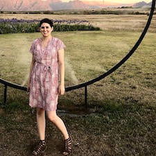 Kayla Byers standing in a field