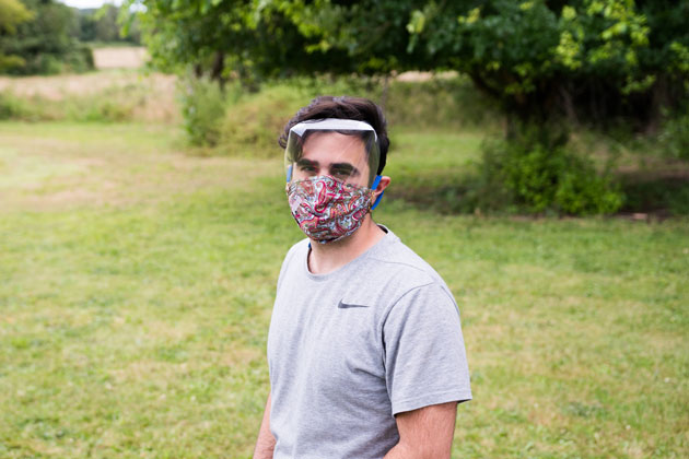 Man wearing OpenShield face shield