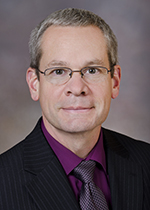 A professional photo of Dr. David Kube.