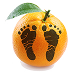 Footprints superimposed on an orange.