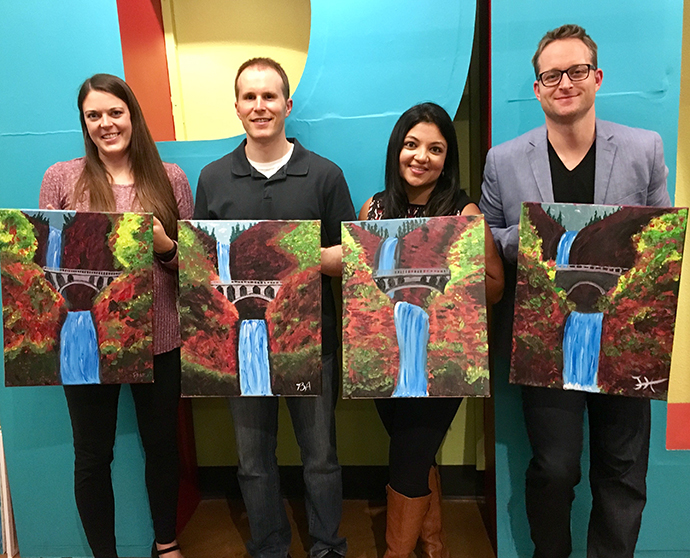 Casey Eye Institute residents and faculty enjoy an art night out together. 