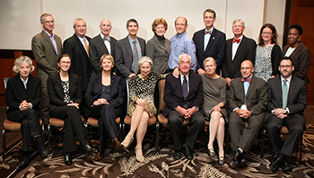 The Editorial Board of a professional journal posing together.